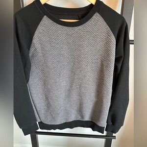 Cute textured sweater. Black and gray zig zag stitch.